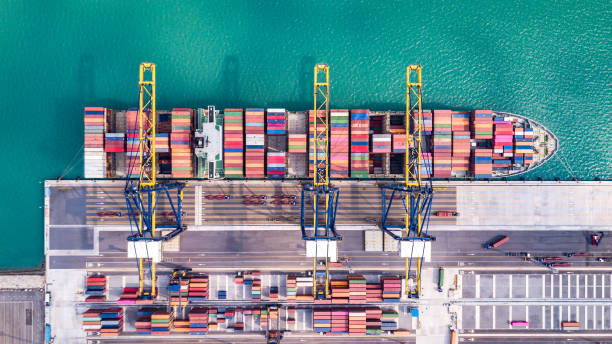 istock The shipping port has many container ships loading and unloading goods for import and export at this port. 2203633660