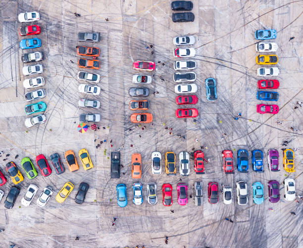 istock A parking lot with many parked cars 2203633866