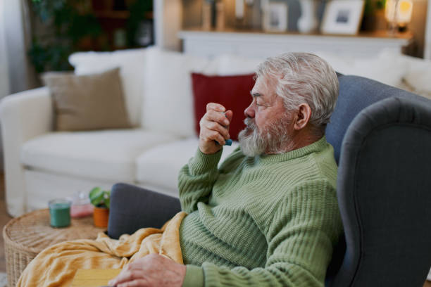 istock Senior inhalation therapy at home 2203637389