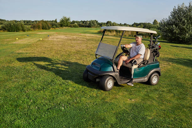 istock A golfer with a prosthetic leg sits in a golf cart, ready to tee off while surrounded by lush greenery at a local golf course 2203637421