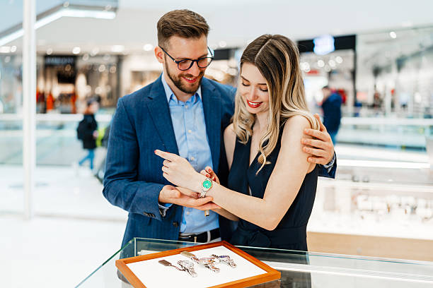 istock Middle age couple in jewelry store 2203638169