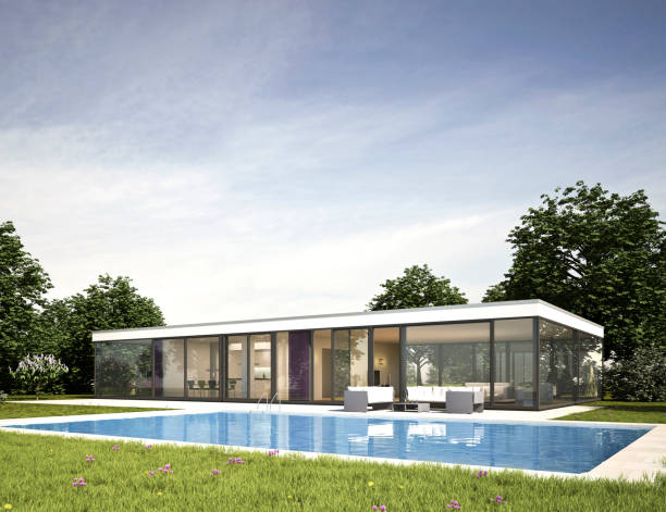 istock Modern glass bungalow with swimming pool 2203640312