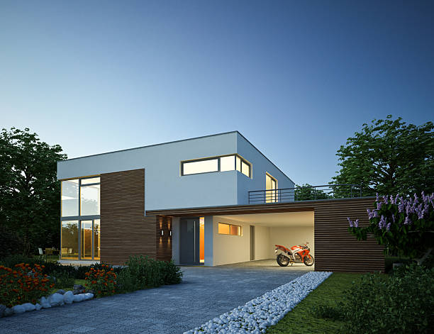 istock Modern cubic villa with garage in the evening 2203640401