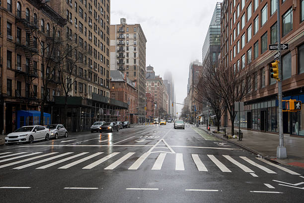 istock New York street in winter with fog approaching 2203641978