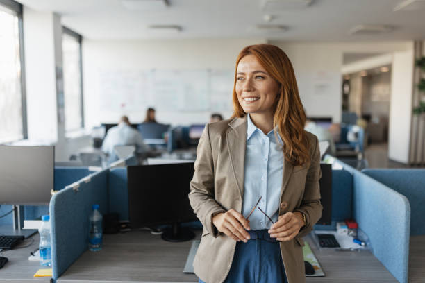 istock Joyful professional radiating positivity in office 2203645086