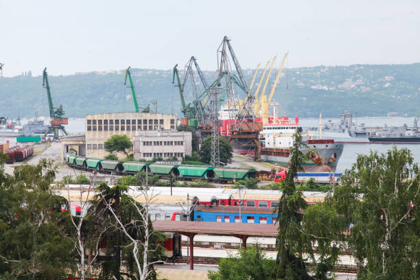 istock Overview of Varna port featuring various cranes, cargo ships, trains 2203647408