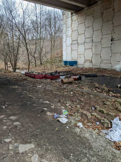 istock Urban Underpass with Litter and Debris Depicting Environmental Pollution 2203652279
