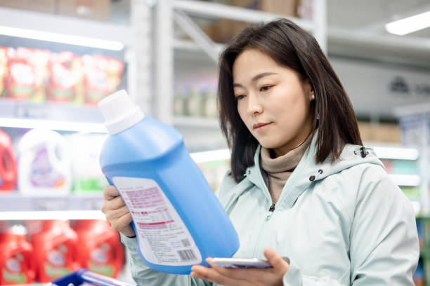 istock Asian women are buying laundry detergent. 2203655441