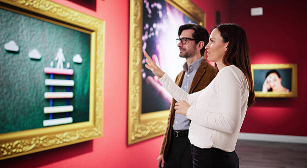 istock Creative Couple Contemplates Contemporary Art 2203656705