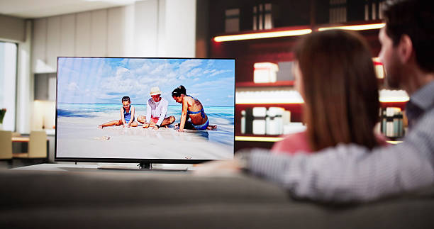 istock Couple Enjoying a Movie Together 2203658248