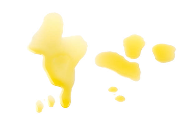 istock Spilled virgin olive oil isolated, oily liquid puddle 2203665847