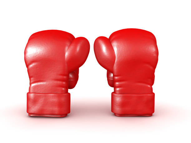 Red boxing gloves on yellow background - Flat lay. Sports and boxing concept