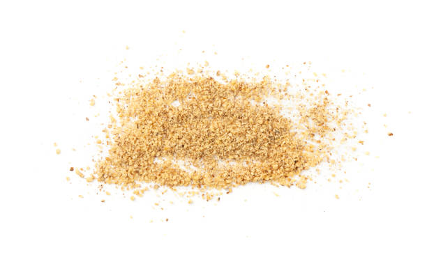 istock Grated wallnut , broken roasted walnuts, heap of nuts crumbs, whole kernel pieces, fractions 2203680083