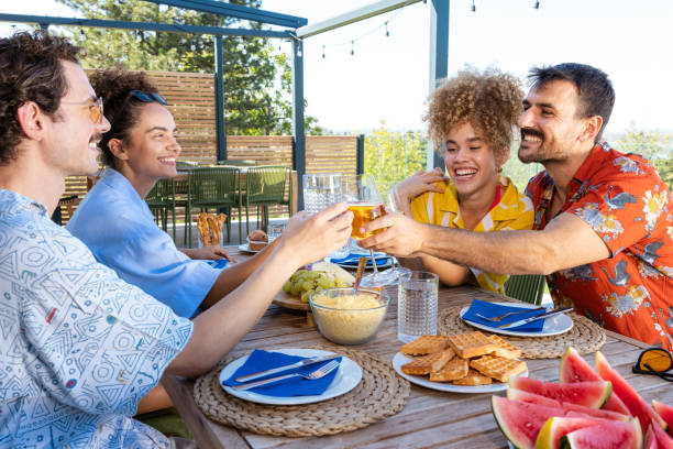 istock Friends toasting and enjoying summer 2203681364