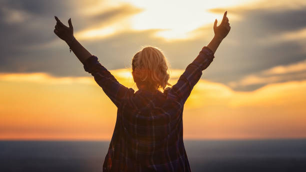 istock Enjoying a peaceful moment at a sunset 2203682493