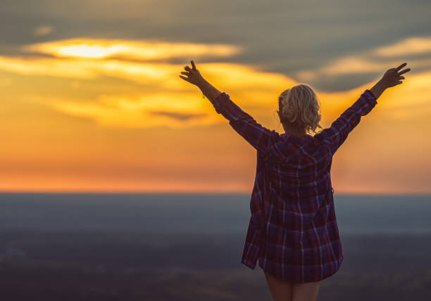 istock Enjoying a peaceful moment at a sunset 2203682504