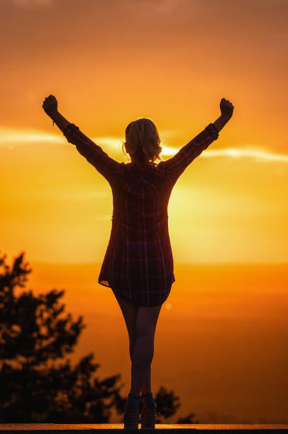 istock Enjoying a peaceful moment at a sunset 2203683016
