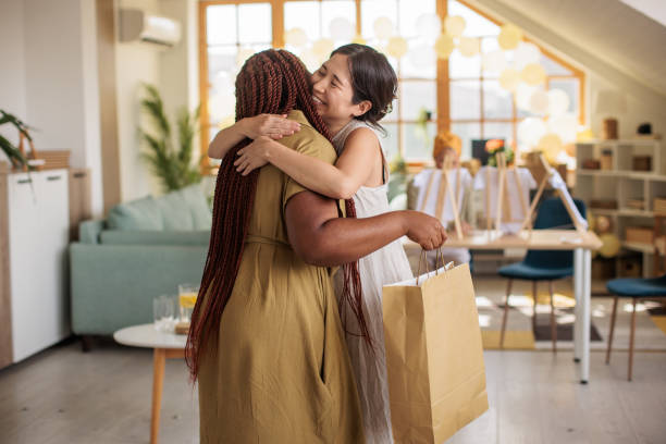 istock Expecting Mom Hugging her Friend 2203691072