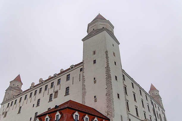 February 20, 2025 Bratislava, Slovakia. Bratislava Castle, a majestic landmark overlooking the city, stands tall against a cloudy sky, showcasing its rich history and architectural grandeur