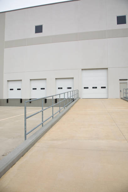 istock Large distribution warehouse cargo bay ramp 2203695939
