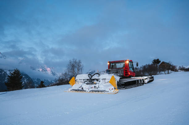 istock Red snow groomer. Ski resort maintenance. 2203700609