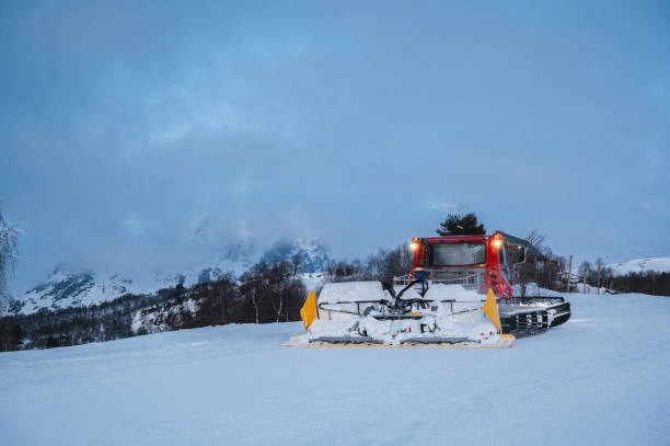 istock Red snow groomer. Ski resort maintenance. 2203700611