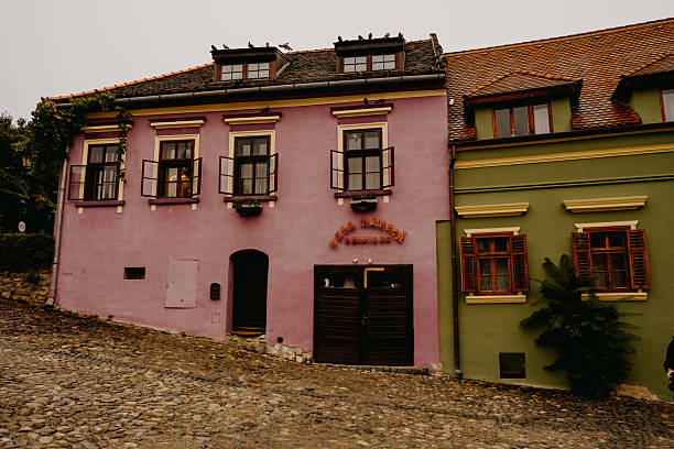 14 September 2024, Sighisoara, Romania. Explore the stunning and vibrant architecture of this picturesque village featuring beautiful and colorful homes
