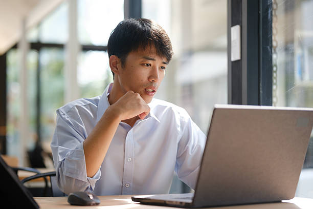 istock Business consultant analyzing financial data on a laptop 2203707986