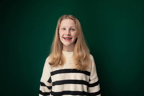 istock Girl in a Black and White Striped Sweater 2203710679