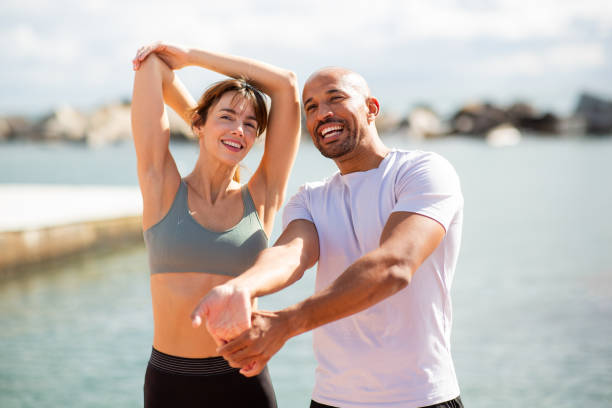 istock Couple Stretching outdoors 2203712681