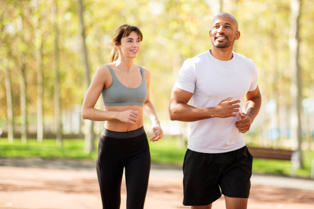 istock Running Together in the Park 2203712788