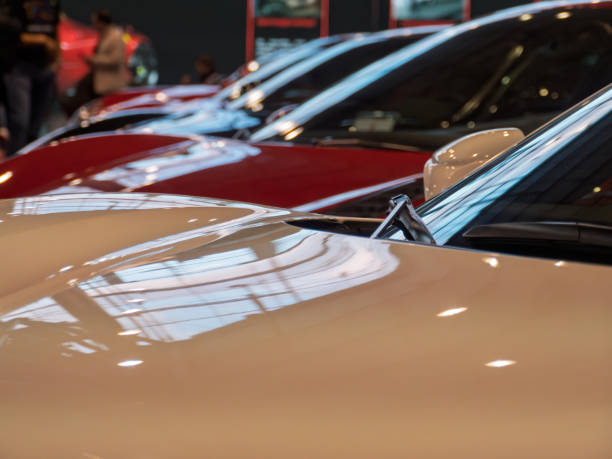 istock Car Show Featuring Multiple Stylish Vehicles in Showcase 2203716497