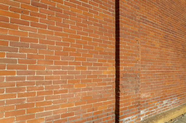istock Vintage orange brick wall texture background 2203718956