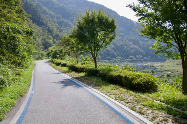 istock Winding Seomjingang Bike Path Along the River 2203723600