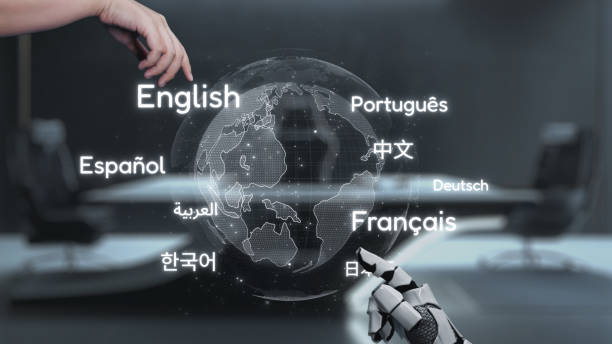 istock Digital Interaction Between Human and Robot with World Languages Displayed on a Holographic Globe. Auvana 2203725394