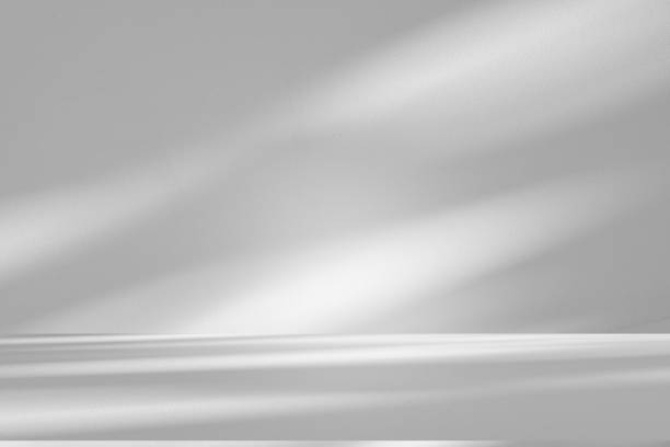 istock Wall interior background, studio and backdrops show products.with shadow from window color white . background for text insertion and presentation product 2203726862