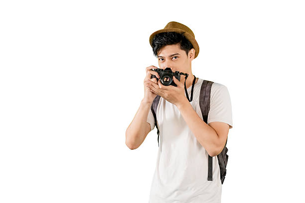 istock Young Traveler with Camera Taking a Photo During Adventure 2203729865