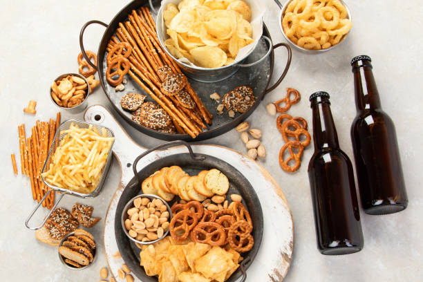 istock Assortment of beer and salty snacks. 2203736510