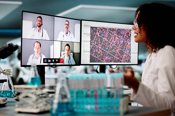 istock Doctor Team Meeting Video Conference 2203738411