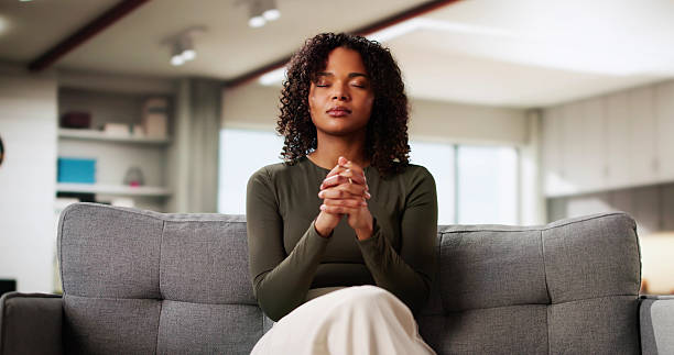 istock African American Woman Praying 2203741027
