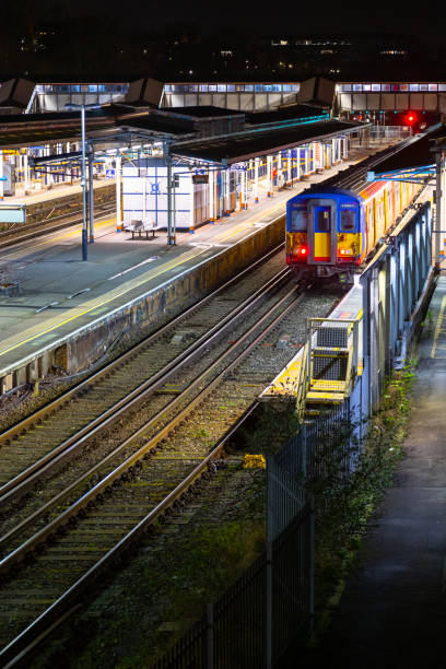 istock Guildford train station at night Surrey England 2203743186