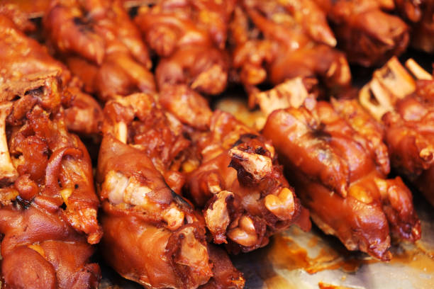 istock braised Pig's trotter (pettitoe) close up 2203743465