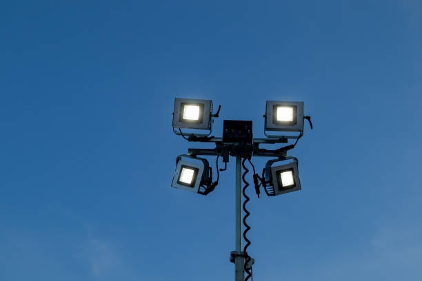 istock LED lights pole against blue sky outdoors 2203748175