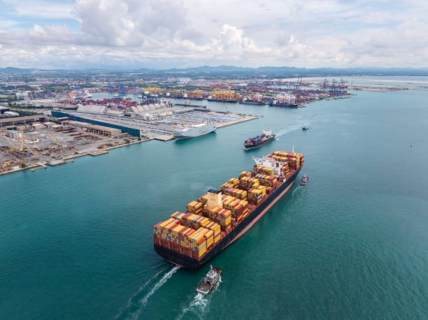 istock cargo container ship carrying sailing in sea import export goods and distributing products to dealer consumers across Asia pacific and worldwide global business transportation by container ship, 2203752094