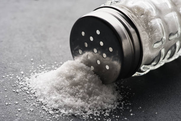 istock Organic salts on black background 2203753691