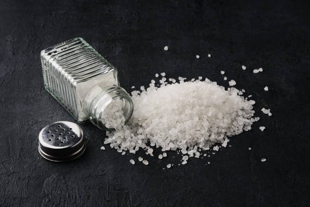 istock Organic salts on black background 2203753710