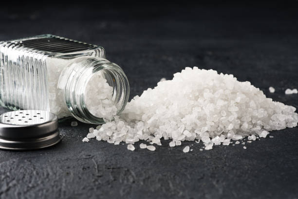 istock Organic salts on black background 2203753736