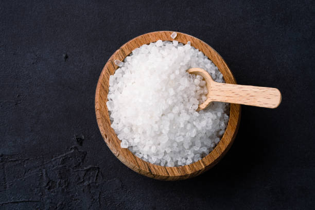 istock Organic salts on black background 2203754388
