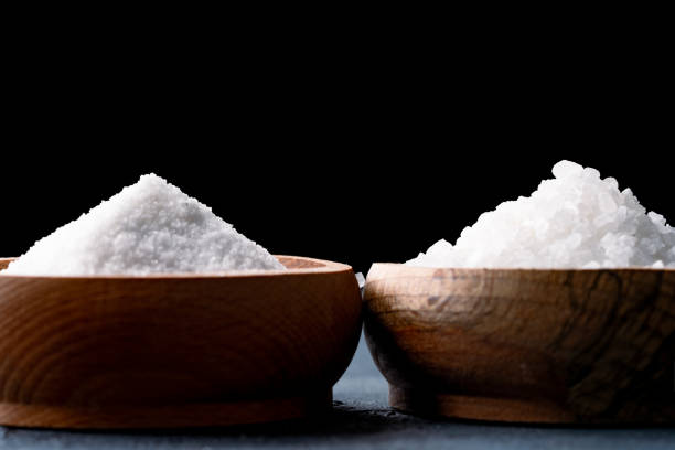 istock Organic salts on black background 2203754491