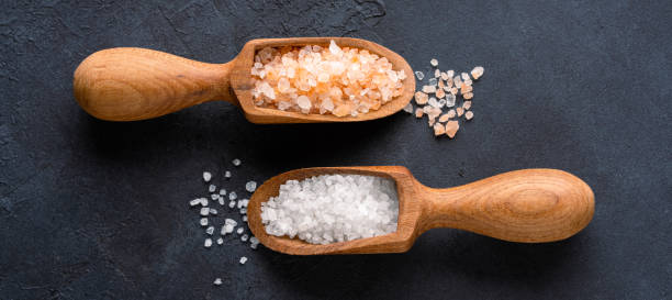 istock Organic salts on black background 2203754496